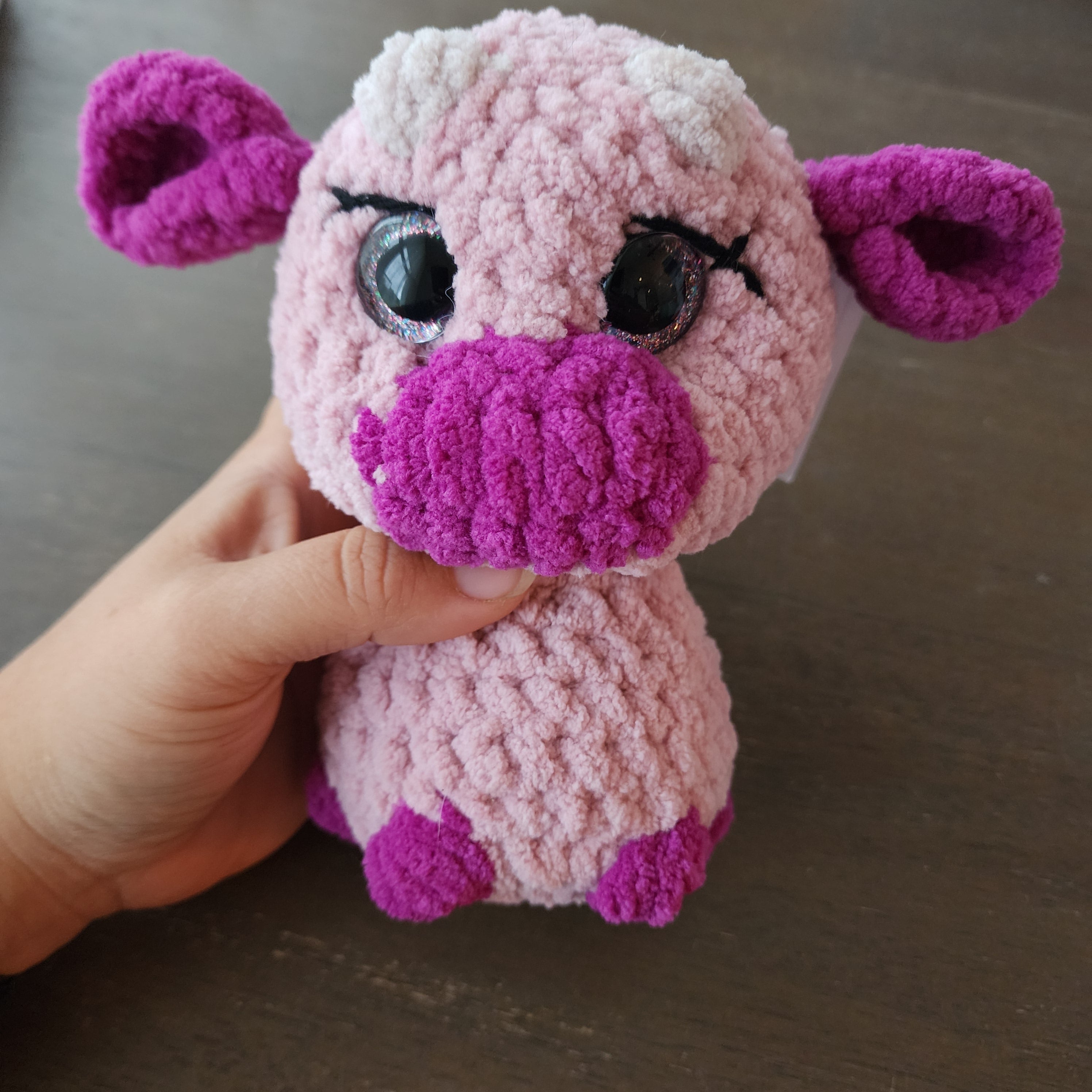 Purple sitting cow